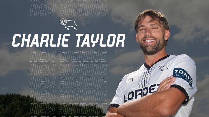 SIGNING: Defender Charlie Taylor signs for Derby County